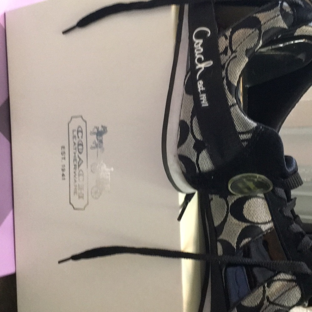 Black and gray Signature Coach  sneakers